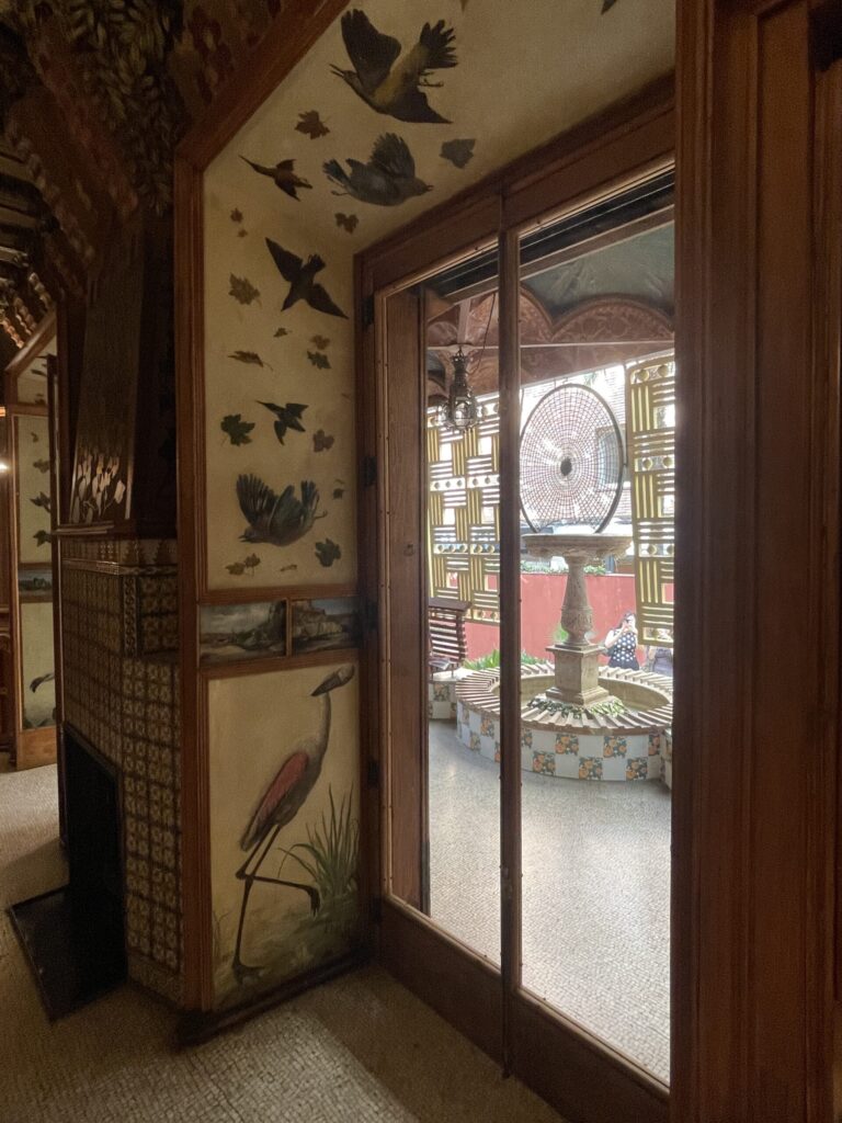 Interior room overlooking gallery fountain at Casa Vicens in Barcelona
